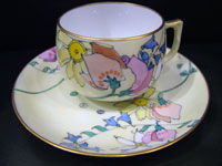 Cup & saucer decorated by Elizabeth Mary Watt